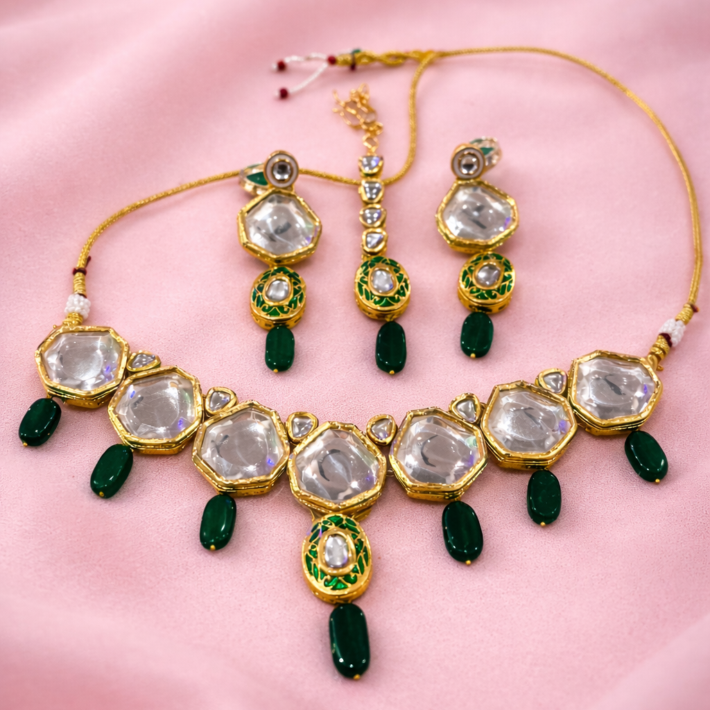 Jewelry set with necklace, earrings, and mangtikka with Jade semi-precious stones. 