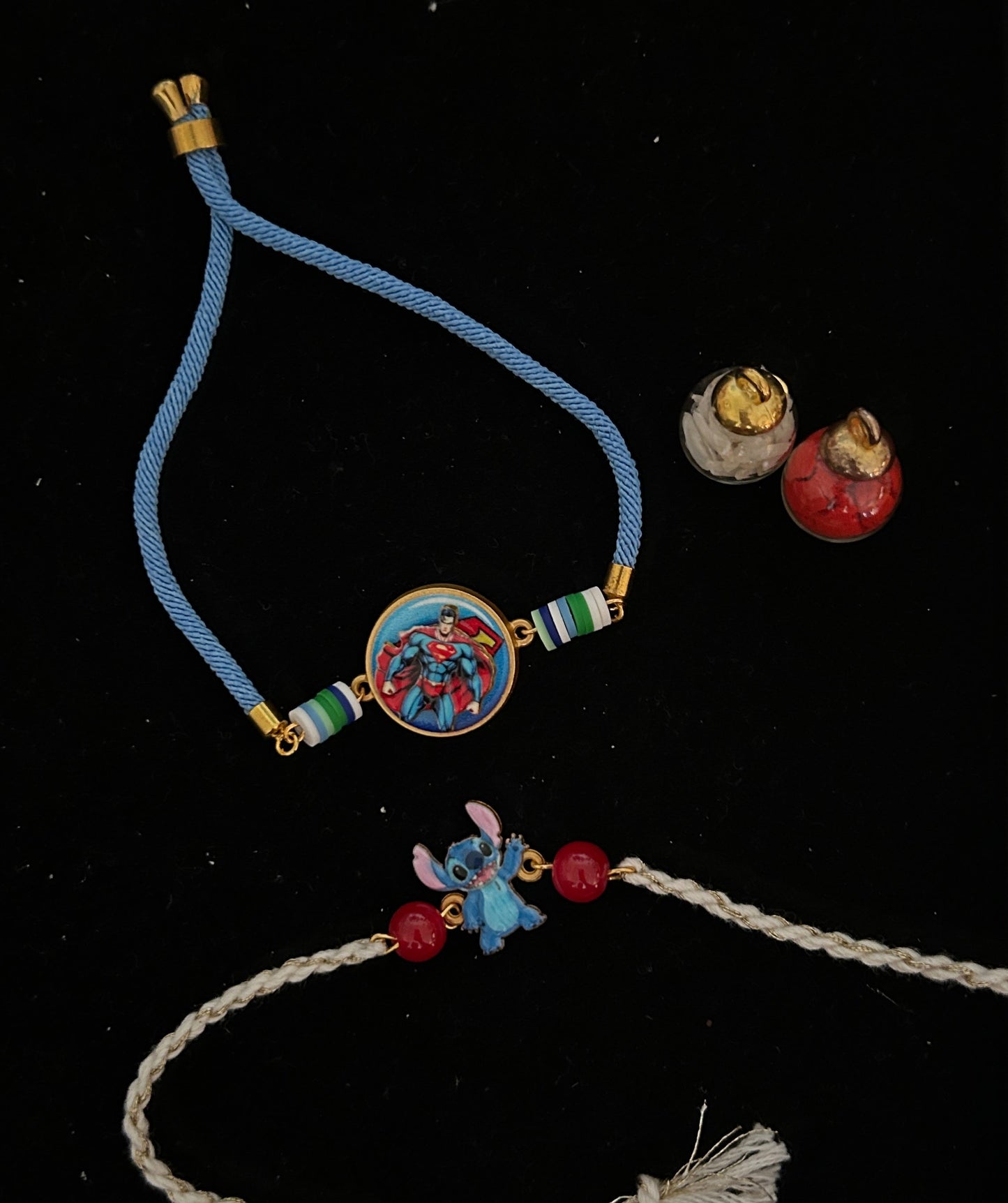 Superman Spinner Bracelet rakhi and a Stitch Charm Kids Rakhi [Set of 2]