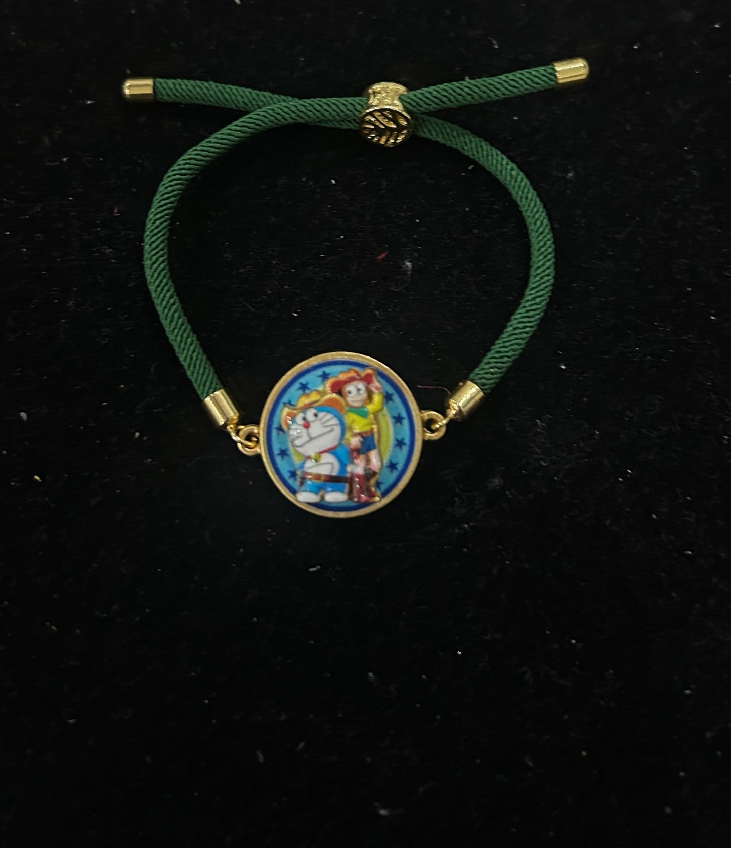 Doremon Spinner bracelet Rakhi with Chocolate