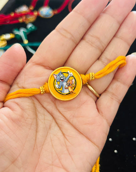 Tom & Jerry Spinner Rakhi with Chocolate